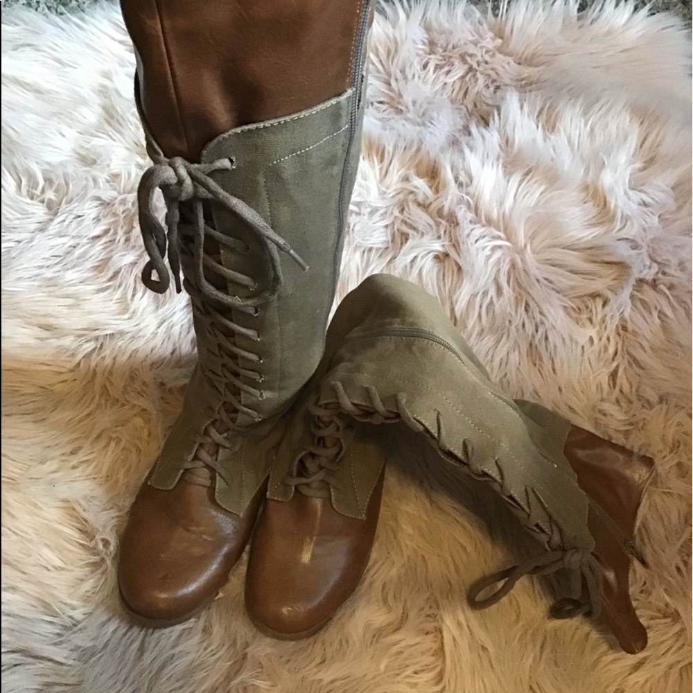 2 Pairs of Brown and Black Lace Up Tall Boots.